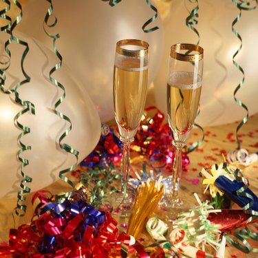 Champagne flutes, streamers and noisemakers