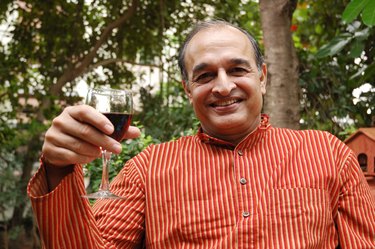 Portrait of a middle aged man having a drink