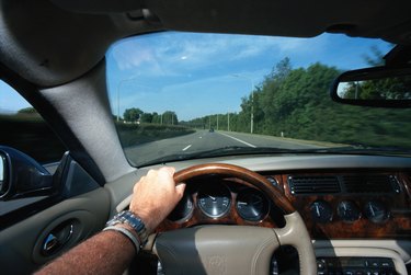 Man driving car, close-up