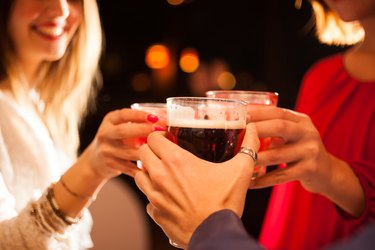 People toasting glasses