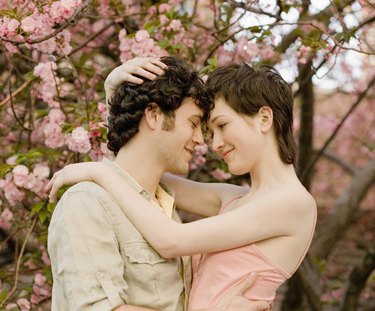 Couple embracing outdoors