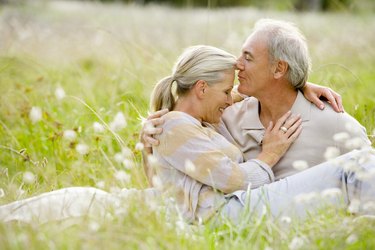 Affectionate couple in field