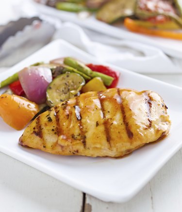 summertime barbecue chicken with vegetables.