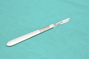 Scalpel on sterile table