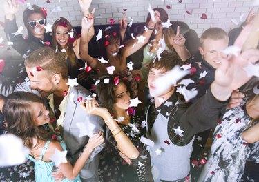 Group of people dancing in a bar or nightclub