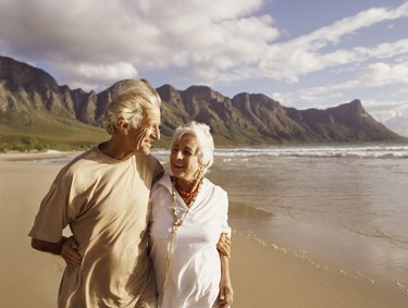 Senior Couple Walking Along a Beach