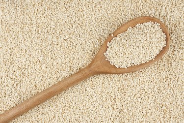 Wooden spoon with sesame seeds