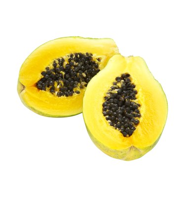 Papaya slices on white background