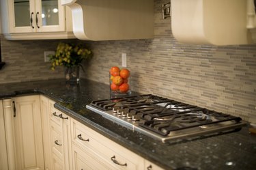 Granite with large flecks of dark and light blue, white, grey and black.