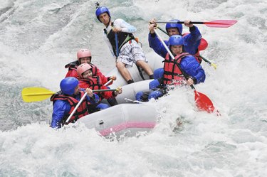 Rafting as extreme and fun sport, splashing the white water