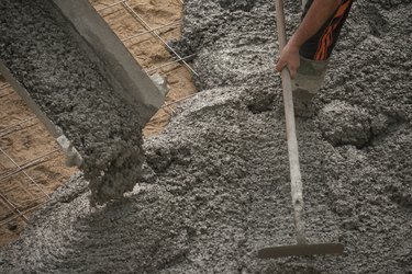 Concrete pouring and worker