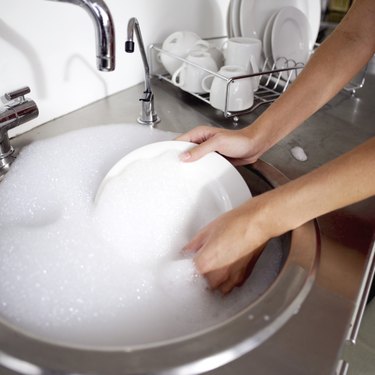 Woman At Sink Washing Dishes by George Marks