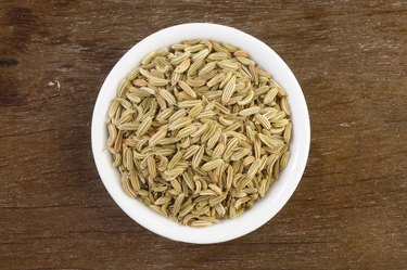 Fennel seeds in white bowl
