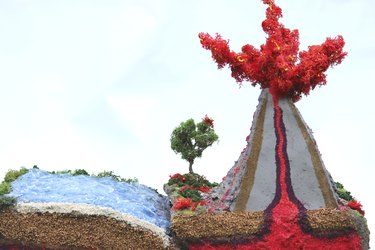 Image of model volcano and destructive plate boundary, school project