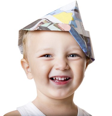 child smile with carpenter hat