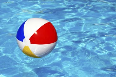 Beach ball in swimming pool