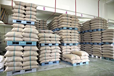 Stacked of Rice sacks in warehouse.