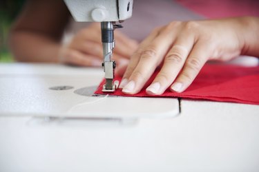 Using sewing machine.