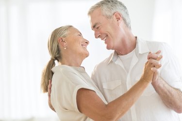 Loving Couple Dancing At Home