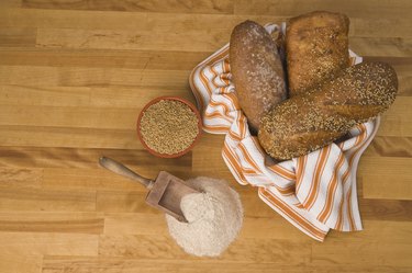 bread with grain and wheat on counter