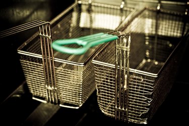 Two wire frier baskets in commercial kitchen