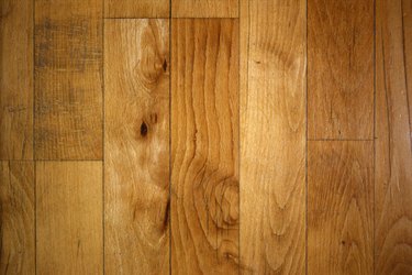 Knotted wood plank flooring