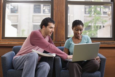 Students working on laptop together