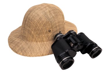 Safari hat and binoculars