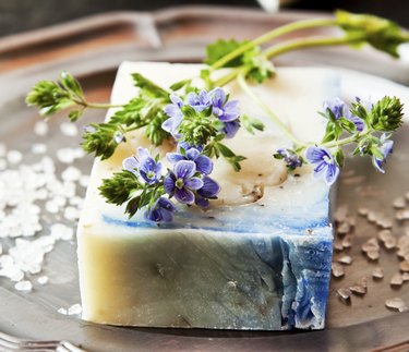Decorate homemade soap with dried lavender sprigs before giving it as gifts.