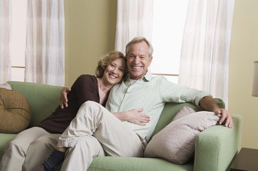 Couple embracing at home