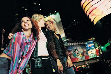 Female Friends in a City at Night