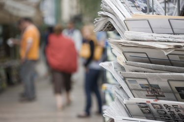 Newspaper rack on street