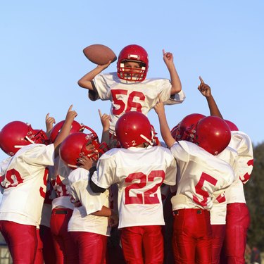 Victorious youth league football team