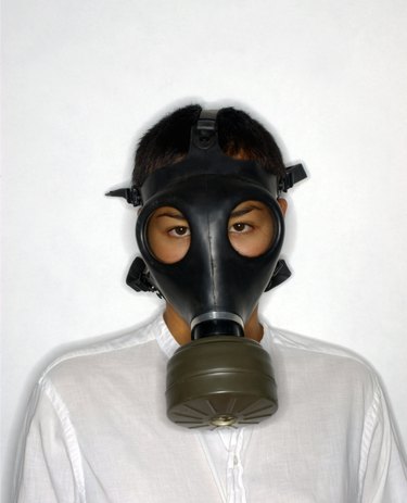 Woman wearing gas mask