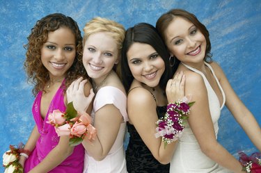 Portrait of Four Girls Wearing Evening Dresses and Corsages