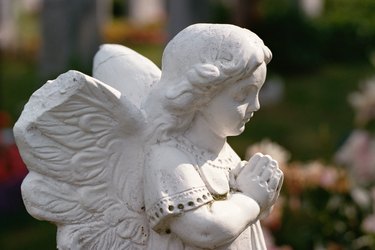 Statue of angel praying