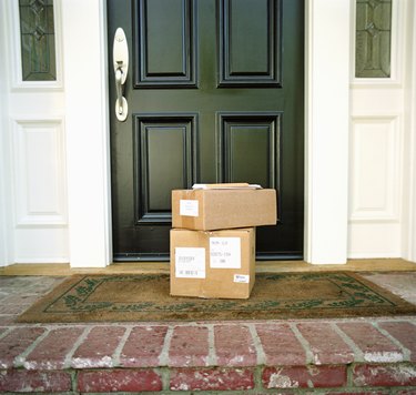 Boxes on doorstep of house