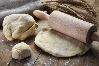 fresh dough and rolling pin