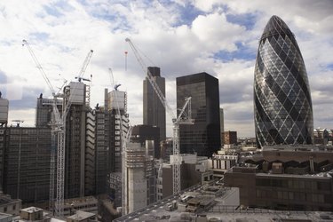 England, London, Sir Norman Foster Building and cityscape