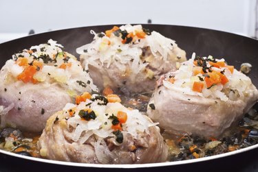 veal shank cooking in pan