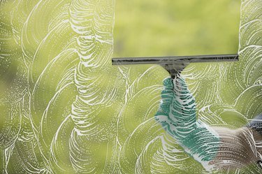 Squeegee wiping window