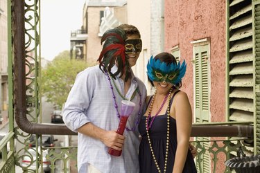Couple with masquerade masks