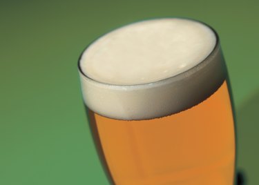 close-up of head of a beer in a glass