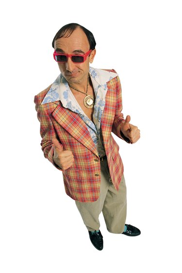 Cheesy guy in leisure suit giving thumbs up