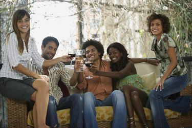 South American friends toasting at party