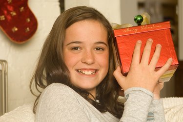 Girl holding Christmas present