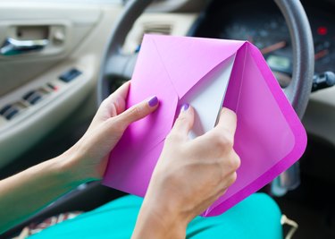 woman sending a letter by mail