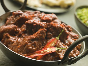 Meat Phall in Karahi with Naan and Green Chilli Curry