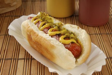 A hot dog with relish and mustard