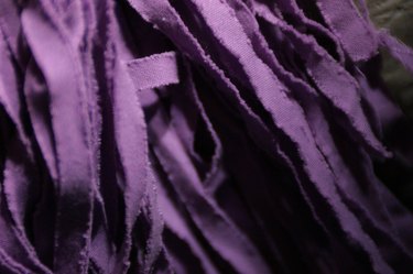 Shreds of purple fabric